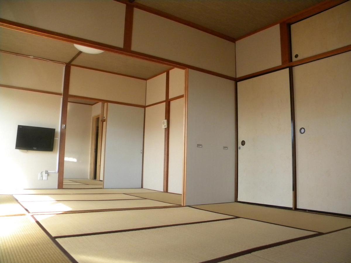 Family Ryokan Kawakyu With Showa Retro, Private Hot Spring Ibuszuki Szoba fotó